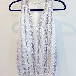 Sleeveless silk Joie top , white with black dots.